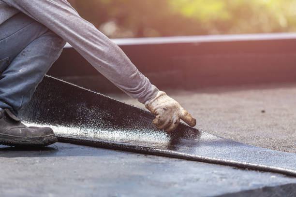 Professional Waterproofing technician working in Hillsboro, IL